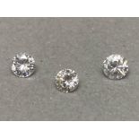 Three loose diamonds amounting to .54ct in total