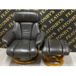 Brown leather reclining armchair with footstool