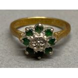 18ct gold ring with centre diamond & surrounding emeralds, size M, 3.5G