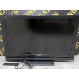 Sony Bravia 40” LCD digital TV on stand with lead & remote
