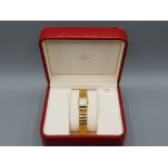 Ladies 18ct yellow gold Omega constellation quadra watch, featuring a square case set with mother of
