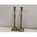 Pair of metal & gilt candlesticks - height 40cm