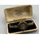 9ct yellow gold mechanical wrist watch on plated bracelet