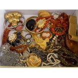 Box of miscellaneous costume jewellery includes faux amber, gilded metal, cameo brooch etc