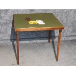 Vintage folding card table with gold flake cards