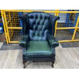 Green leather chesterfield wing back fireside chair