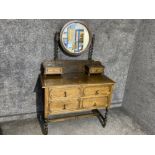 Oak dressing table on barley twist supports fitted with 4 drawers