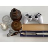 Box of miscellaneous items to include PS3 controller, Wooden cup, glass salts etc