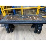 Heavily carved & inlaid coffee table with twin pedestal elephant bases