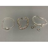 Three silver bracelets of various designs 43.2g