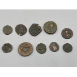 Ten Roman coins of various sizes