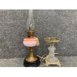 Two oil lamps, one converted to electricity