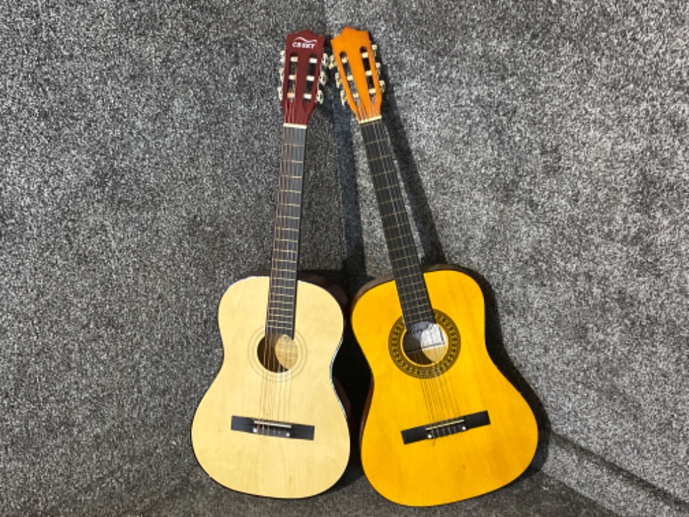 Two acoustic guitars includes makers Herald & CBSKY music pro series