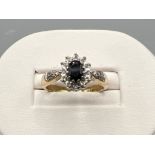 Ladies 9ct gold sapphire and diamond cluster ring. 3.2g size M