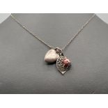 Silver heart locket and ladybird pendant and necklace
