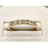 Ladies 18ct gold diamond half eternity ring. Featuring 11 round brilliant cut diamonds size P 2.5g