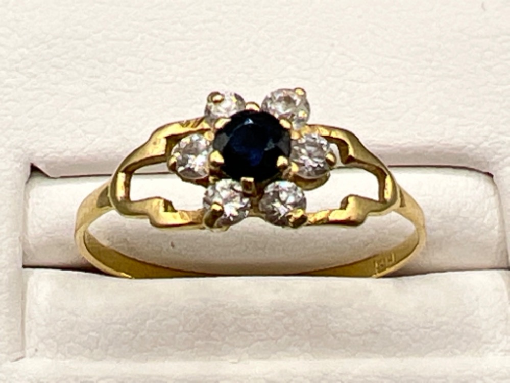 Ladies 18ct gold sapphire and white stone cluster ring. Size P