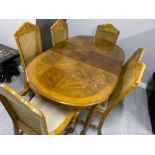 Extending dining table & 6 bergere backed chairs