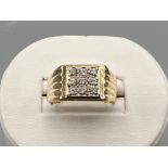 Gents 9ct gold 9 stone cz ring. 5.9g size U