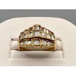 Stunning ladies 18ct gold baguette diamond ring. Comprising of 45 baguette cut diamonds approx .