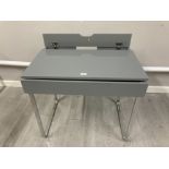 A grey colour desk