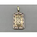 Gold and silver stone set rectangular pendant with blue and white set stones 9.6g