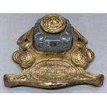A gilt metal inkwell by Ryhope and Silksworth dated 1907
