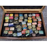 A collection of vintage gramophone tins, most with contents