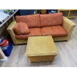 Large wicker two seater conservatory sofa with matching glass topped coffee table