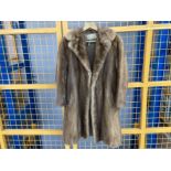 A brown mink fur 3/4 length coat, made in Canada
