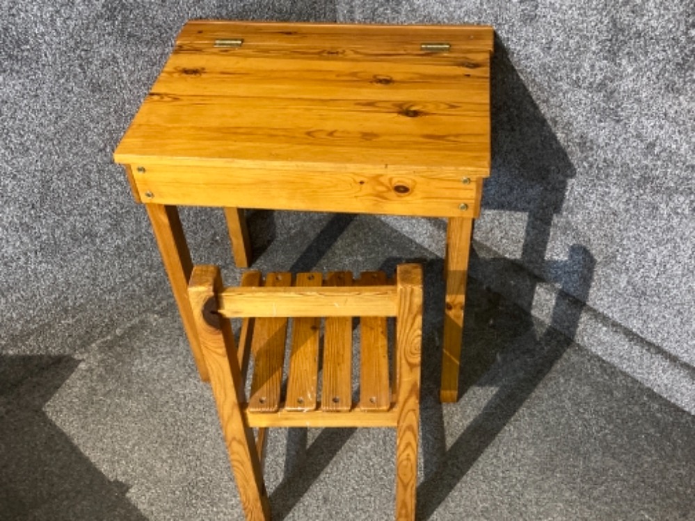 A pine child’s desk and chair