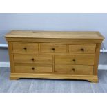 Light oak 7 drawer low sideboard