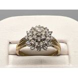 Ladies 9ct gold diamond cluster ring. Comprising Of 31 round brilliant cut diamonds 2.7g size N