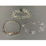 Two silver bracelets and a silver bangle 51.2g