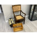 Mahogany framed split cane seated & backed commode armchair together with wooden magazine rack