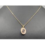 Ladies 9ct gold pink/purple stone and diamond pendant necklace. 4g
