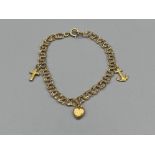 9ct gold double curb link bracelet with 9ct gold charms Faith, Hope and Charity