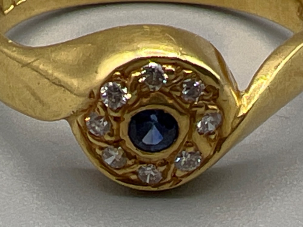 Ladies hallmarked 18ct gold sapphire and diamond ring. Comprising of a Round cut sapphire surrounded - Image 2 of 3