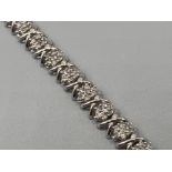 Ladies 10ct white gold approx 4.62ct diamond bracelet. 14.3g 18cms in length