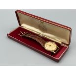 Vintage original Garrard 9ct gold gents mechanical watch in original box. Good working order