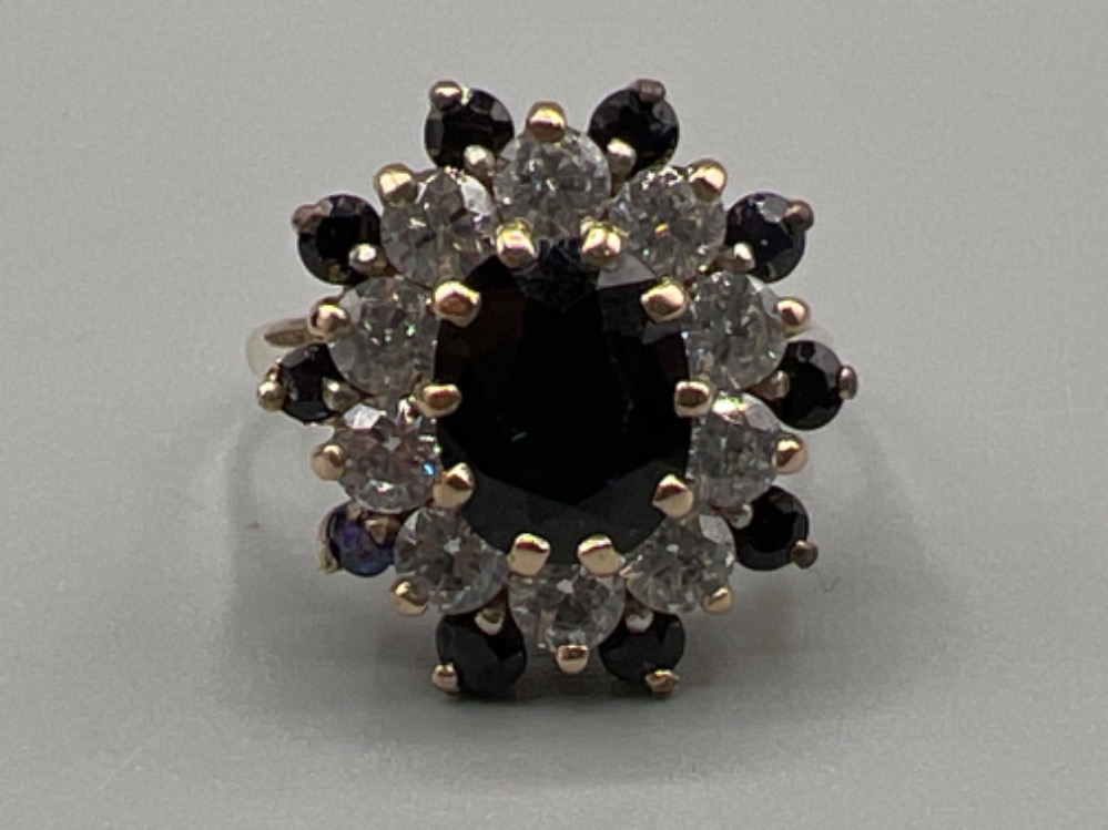 Ladies 9ct gold sapphire and cz cluster ring. 1.25ct central stone 3.3G size K