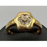 Ladies antique 18ct gold hallmarked 7 stone diamond cluster ring. Comprising of 7 round cut diamonds