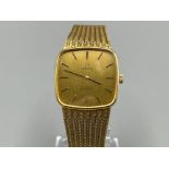 Vintage gents 18ct gold Omega watch with solid 18ct gold strap. Good working order 73.5g