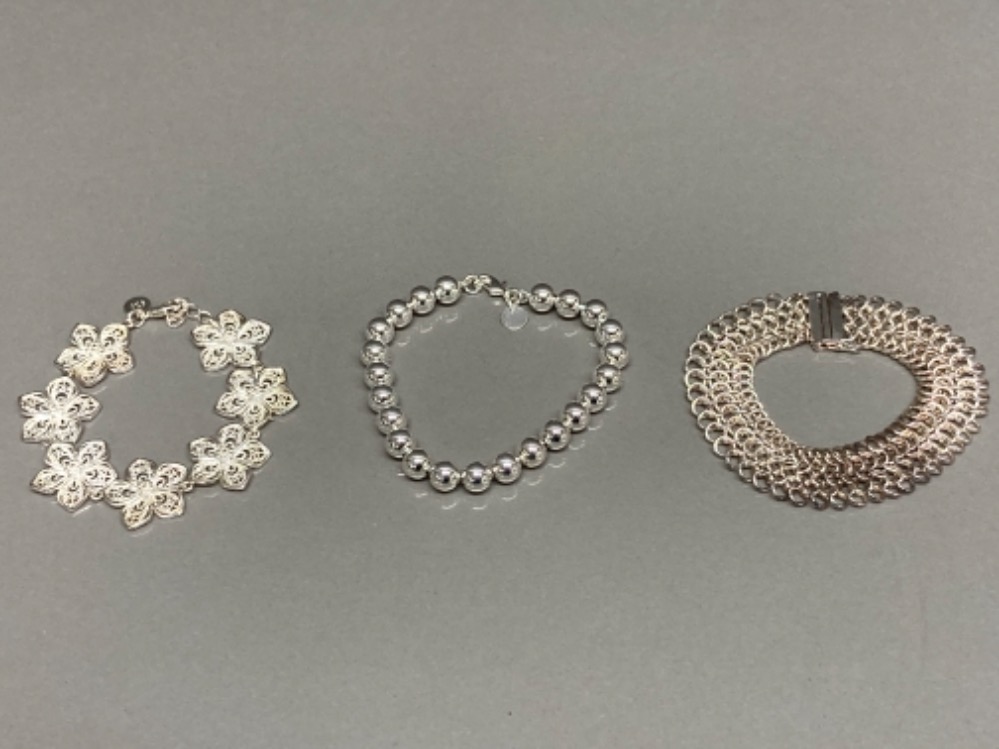 Three silver bracelets of different designs 51.4g