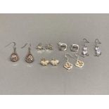 Six pairs of silver earrings to include butterfly pattern and CZ drop earrings 23.3g gross