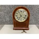 An Edwardian inlaid mahogany mantle clock with key