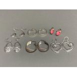 Six pairs of silver earrings to include a pair with pink enamel 43.1g gross