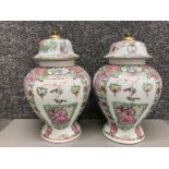 A pair of Chinese famille rose ginger jars with brass finials 34cm high