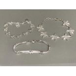 Three silver bracelets including one with starfish design 40.6g