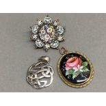 Two pendants includes Victorian hand painted & Celtic silver also includes an Italian Micro M